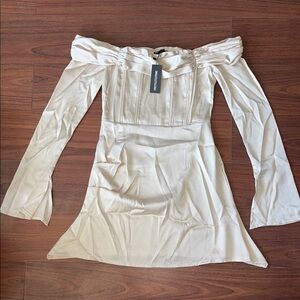 Pretty little thing 🩷  Champagne satin pleated Bardot flared sleeve dress